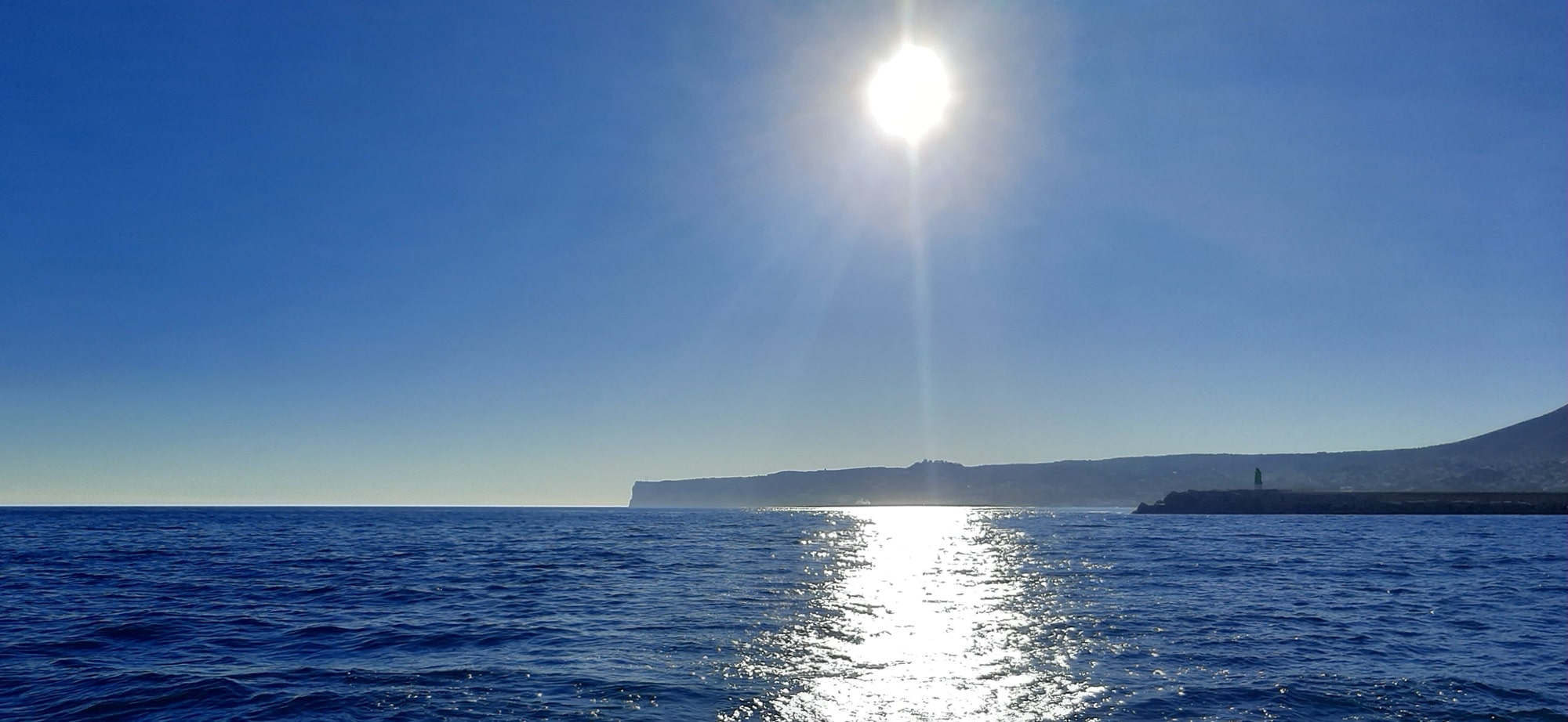 Cabo San Antonio Gegenlicht ad mediterraneum seebestattung mittelmeer